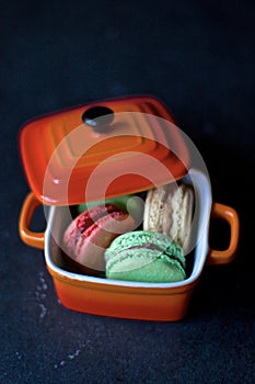 Colors of macaron in a mini pot