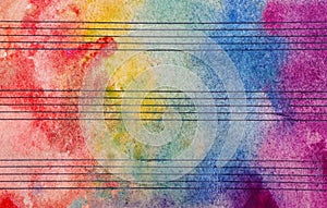 Colors of rainbow. Melody concept. Old music sheet in colorful watercolor paint. Music concept. Abstract colorful watercolor backg