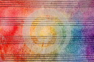 Colors of rainbow. Melody concept. Old music sheet in colorful watercolor paint. Music concept. Abstract colorful watercolor backg