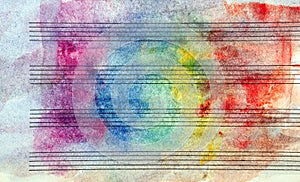 Colors of rainbow. Melody concept. Old music sheet in colorful watercolor paint. Music concept. Abstract colorful watercolor backg