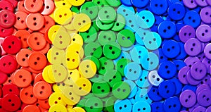Colors of rainbow. Pattern of multicolored buttons texture background