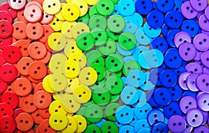 Colors of rainbow. Pattern of multicolored buttons texture background