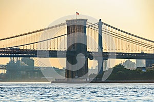 Colors of sunrise over Brooklyn Bridge, New York, USA