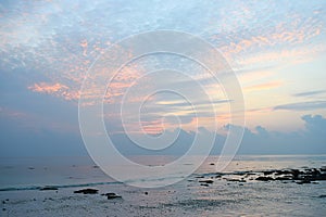 Colors of Sunrise in Sky at Stony Beach - Kalapathar beach, Havelock Island, Andaman Nicobar Islands, India
