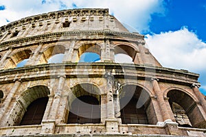 Coloseum against bright bluse sky in Rome Italy