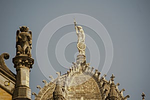 Colossal 5.03 metre structure of a lady atop the central dome Victoria Turminus Railway Station nowCSMT Railway Station a UNESCO w