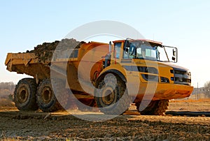 Colossal Dump Truck with a full load of Dirt