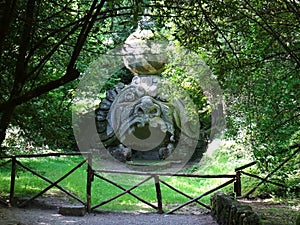 Colossal statue in the forest of Bomarzo. Italy