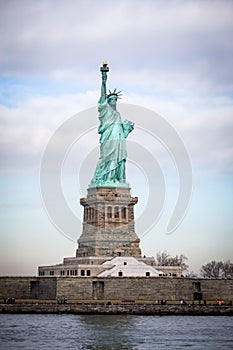 Colossal Statue of Liberty on Liberty Island in New York Harbor