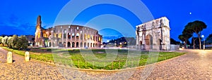 Colosseum and Arch of Constantine square panoramic dawn view in Rome
