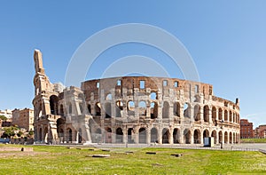 Colosseum or Coliseum Flavian Amphitheatre or Amphitheatrum Flavium or Anfiteatro Flavio or Colosseo. Oval amphitheatre in the ce photo