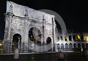 Colosseum and Constantine Arch night view, Rome.