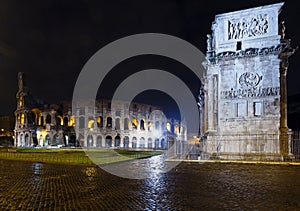 Colosseum and Constantine Arch night view, Rome.