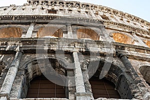 Colosseum famous and blackened grimy exterior closeup of iconic ancient arena, Rome