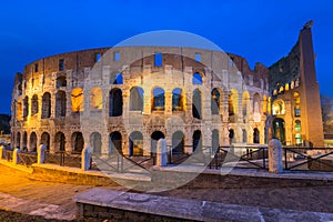 The Colosseum illuminated at night in Rome, Italy