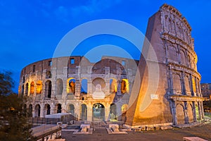 The Colosseum illuminated at night in Rome, Italy