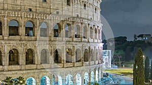 Colosseum illuminated at night timelapse in Rome, Italy