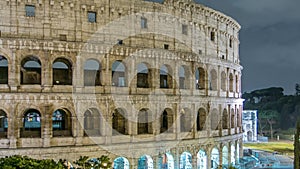 Colosseum illuminated at night timelapse in Rome, Italy