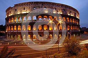 Colosseum, at night, landmark attraction in Rome - Italy