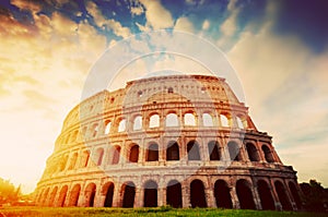 Colosseum in Rome, Italy. Amphitheatre in sunrise light. Vintage