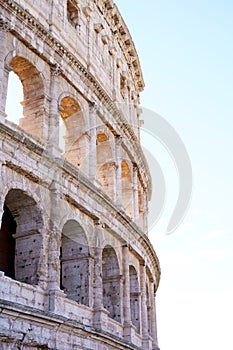 Colosseum in Rome, Italy on cloudy sky background. The Colosseum. Famous place. Historical buuilding on cloudy blue nice