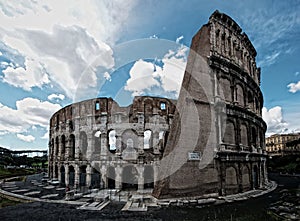 Colosseum Rome Italy Mar-18-11 dramatic blue sky clouds architecture gladiator arena roman amphitheatre