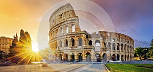 Colosseum in Rome and morning sun, Italy