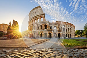 Colosseum in Rome and morning sun, Italy