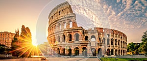 Colosseum in Rome and morning sun, Italy