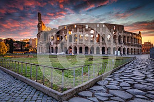 The Colosseum in Rome at sunrise, Italy