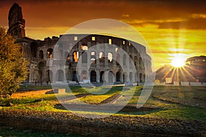 The Colosseum in Rome at sunrise, Italy