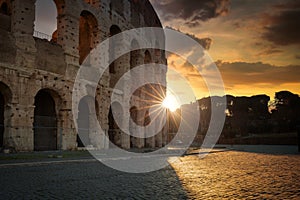 The Colosseum in Rome at sunrise, Italy