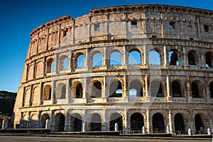 The Colosseum in Rome at sunrise, Italy