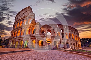 Colosseum at sunset, Rome. Rome best known architecture and landmark. Rome Colosseum is one of the main attractions of Rome and