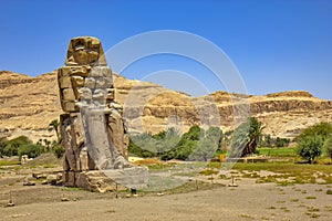 The Colossi of Memnon statues of the Pharaoh Amenhotep III in Egypt photo