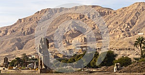 Colossi of Memnon are two massive stone statues Pharaoh Amenhotep III