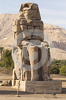 Colossi of Memnon are two massive stone statues Pharaoh Amenhotep III. photo