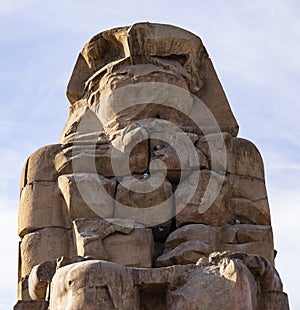 Colossi of Memnon are two massive stone statues Pharaoh Amenhotep III photo