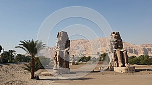 Colossi of Memnon whistle pharoah statues in Luxor Egypt