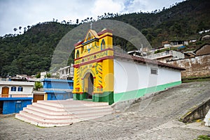 Colour facade of the church in the San Andres Xecul in Guatemala, Central America photo