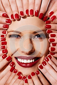 The colour is too much. A young woman with multiple sets of hands on her face.
