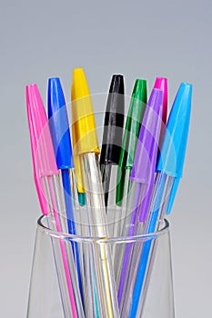 Coloured ballpoint pens.