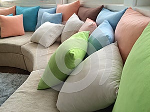 Coloured cushions on a sofa