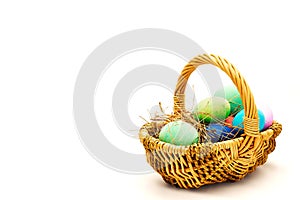 Coloured Easter eggs in the basket