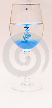 Coloured Food Dye in Wine Glasses