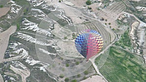 Coloured Hot Air Balloon Flying Over Cappadocia