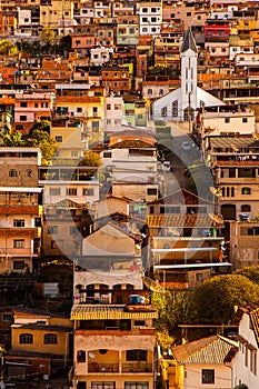 Coloured houses and church in a sloping city in Minas Gerais - Brazil