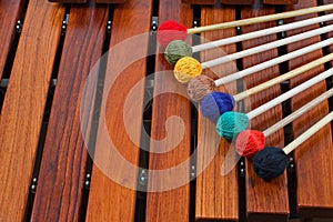 Coloured mallets on marimba