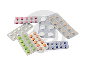 Coloured pills on white background. Isolated