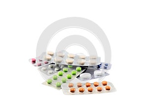 Coloured pills on whitebackground.